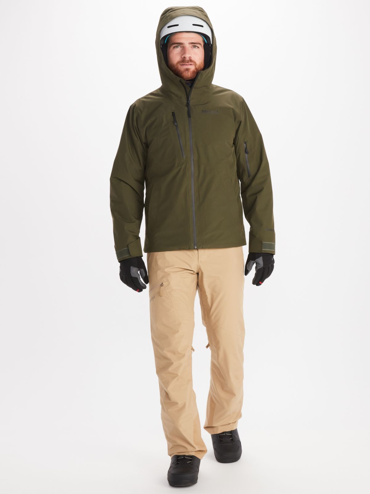 Man walking wears Marmot mens ski jacket in dark green