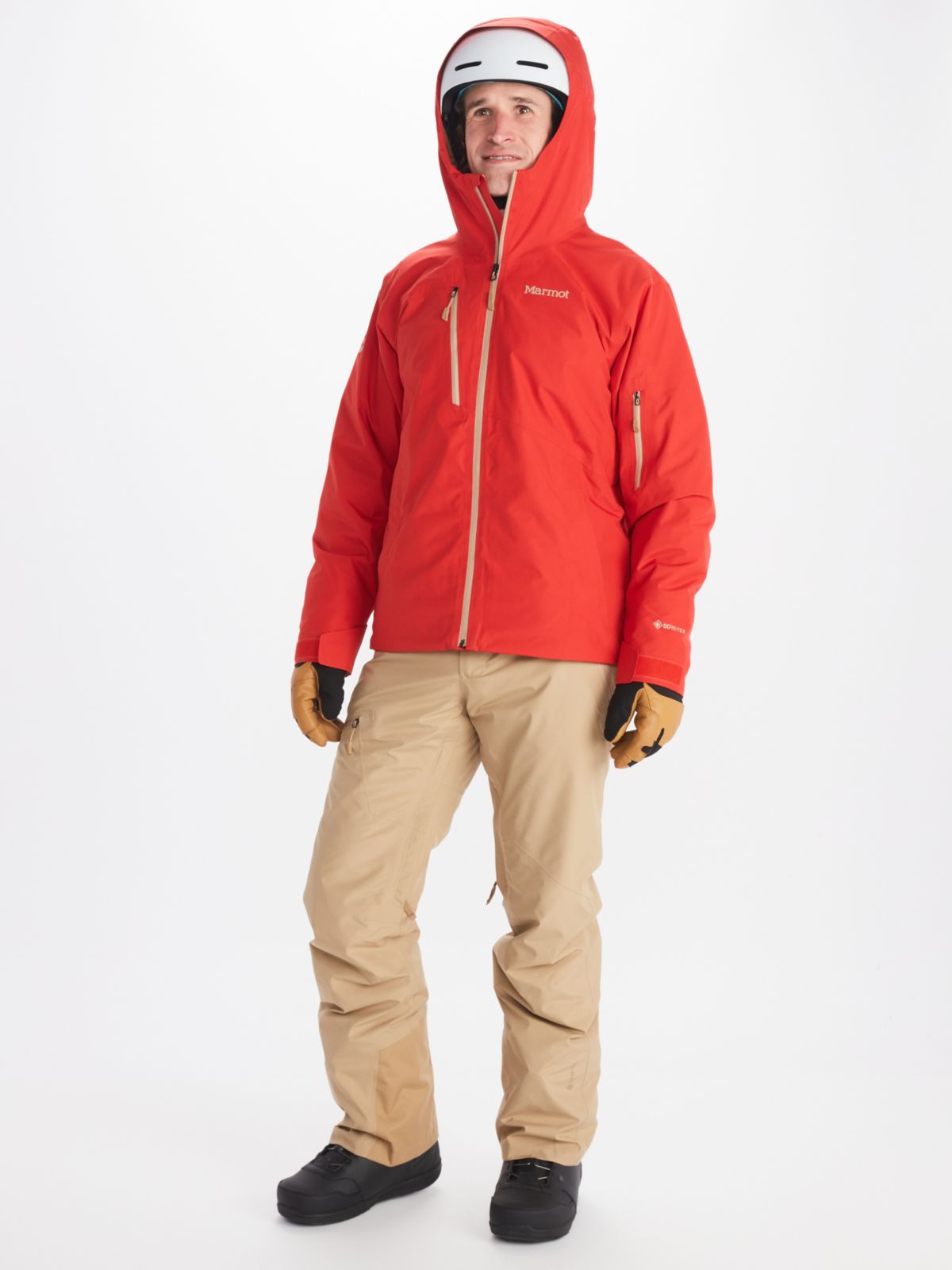 Man dressed for skiing wears Marmot red mens ski jacket