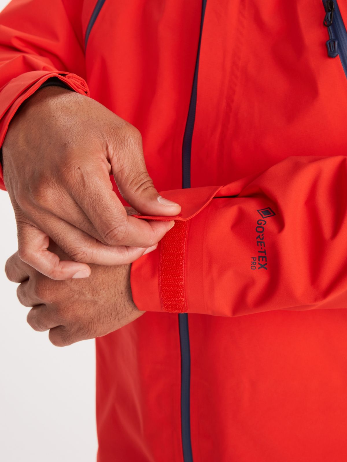 close up of velcro closure on sleeve for men alpinist jacket