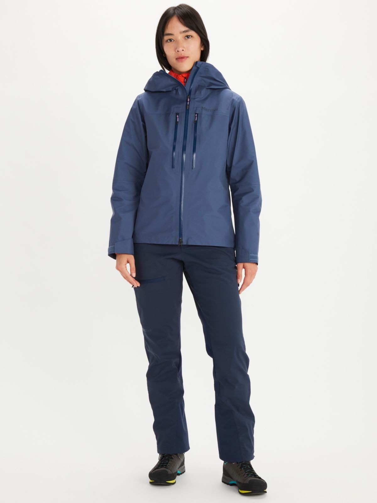 female model wearing windbreaker hiking jacket