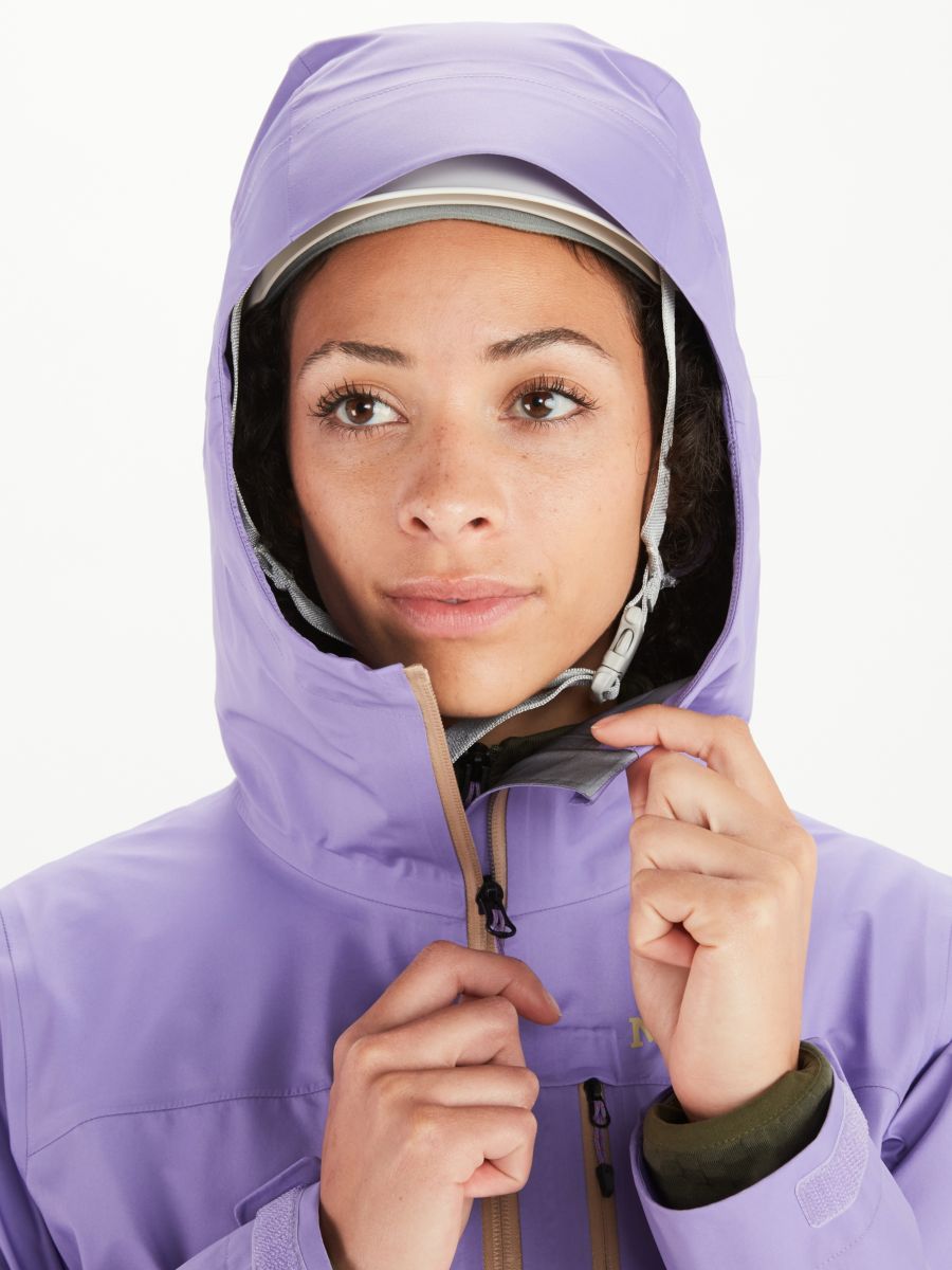 climber modeling light jacket with hood