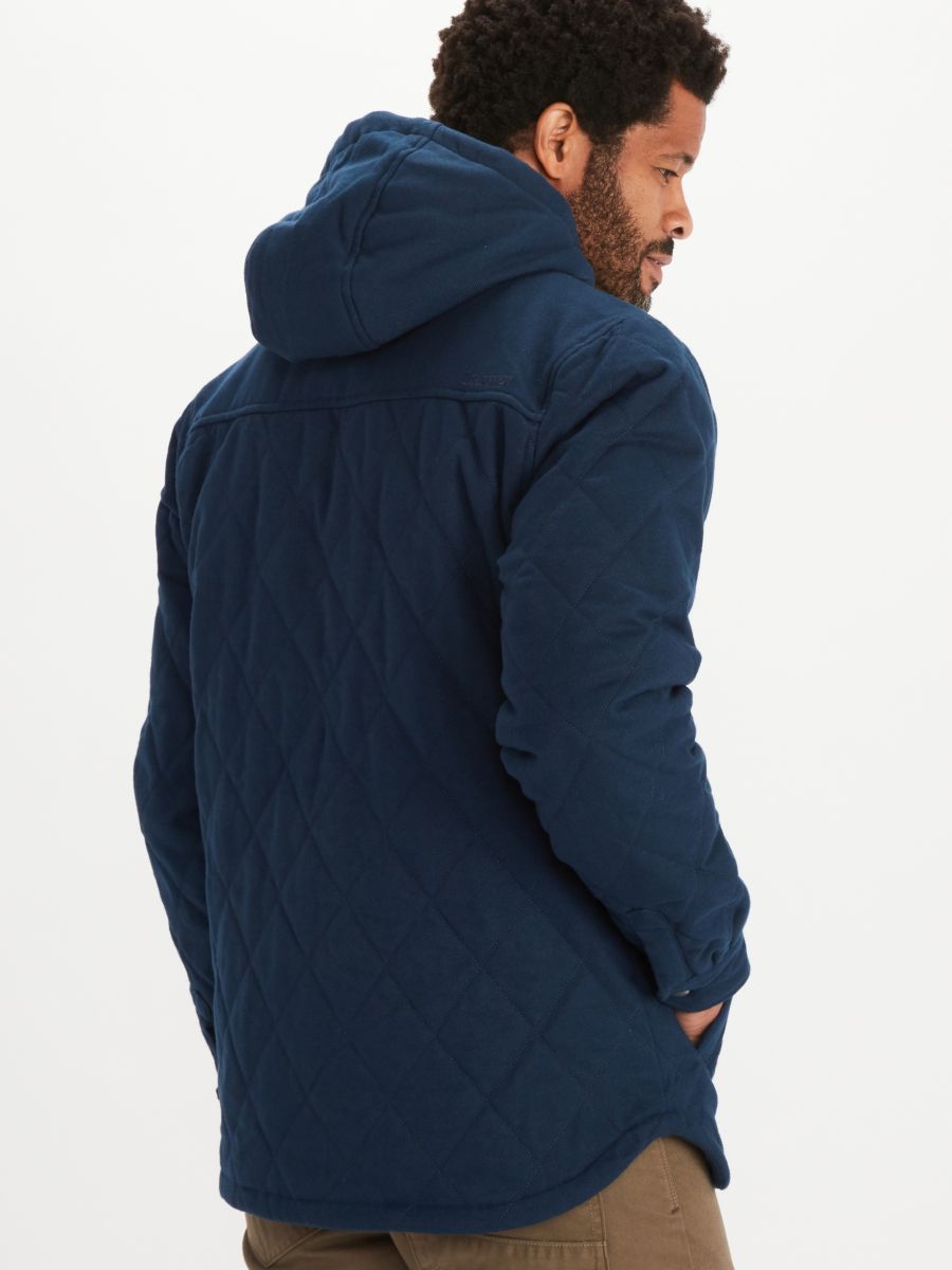 man modeling back of mt rose insulated flannel hoody in dark indigo