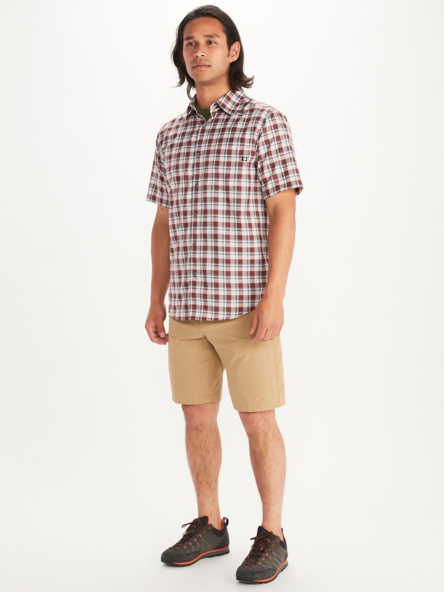 man modeling short sleeve button down shirt and shorts