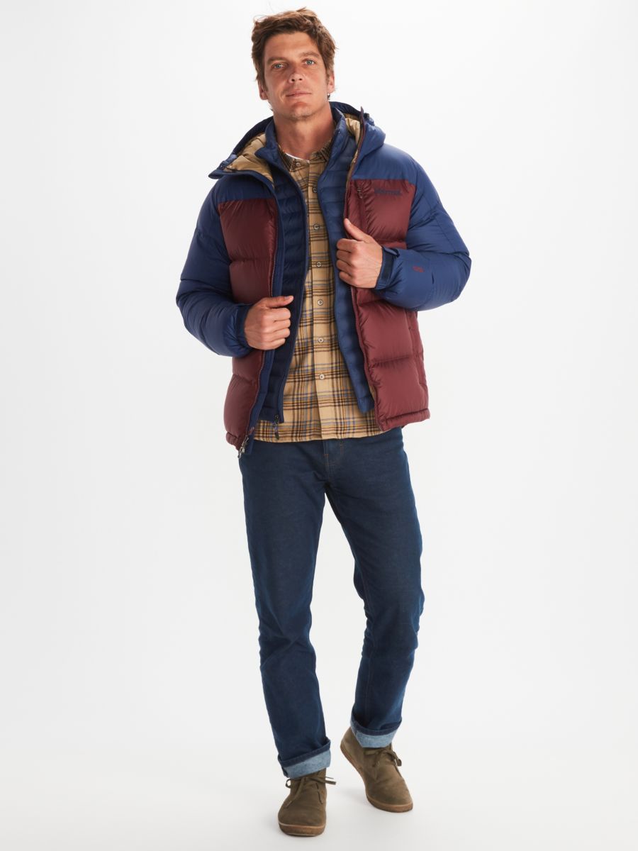 Man in burgundy and blue insulated coat