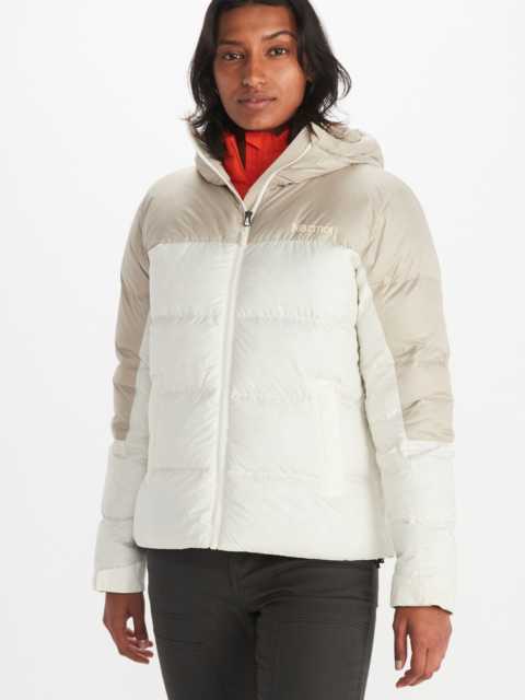 model wearing women's puffer jacket and hiking pants