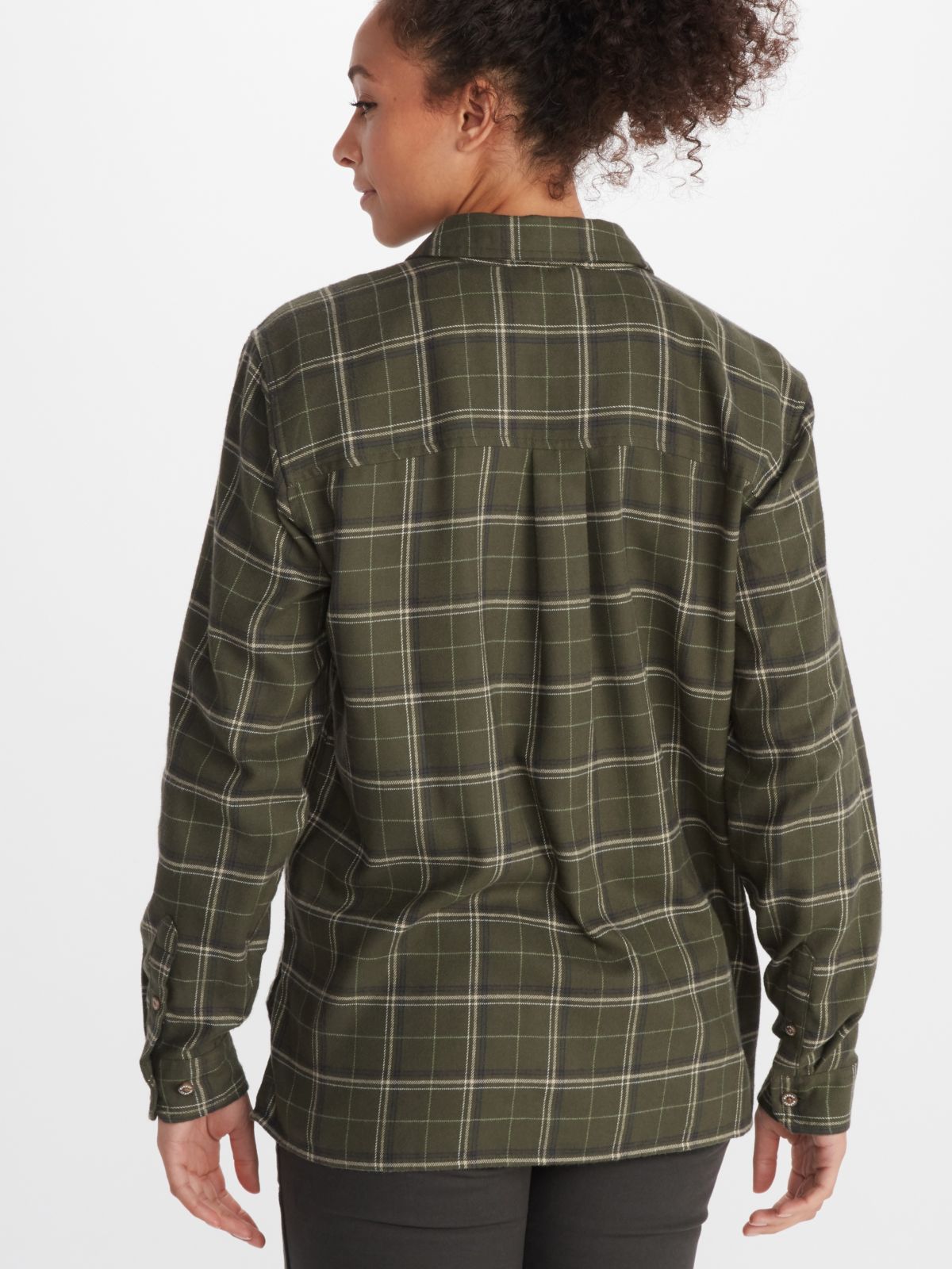 back of woman posing in outdoor clothing