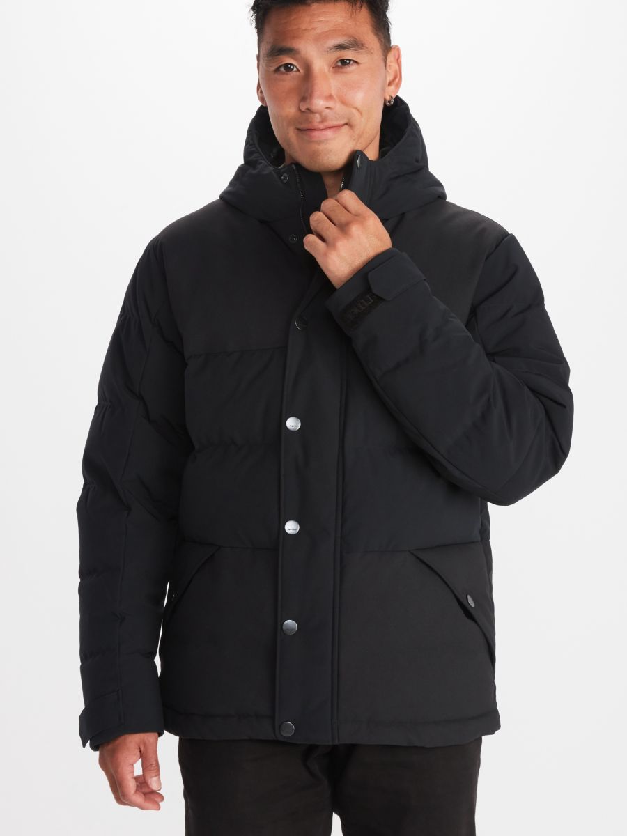 Man in black puffer coat with a hood