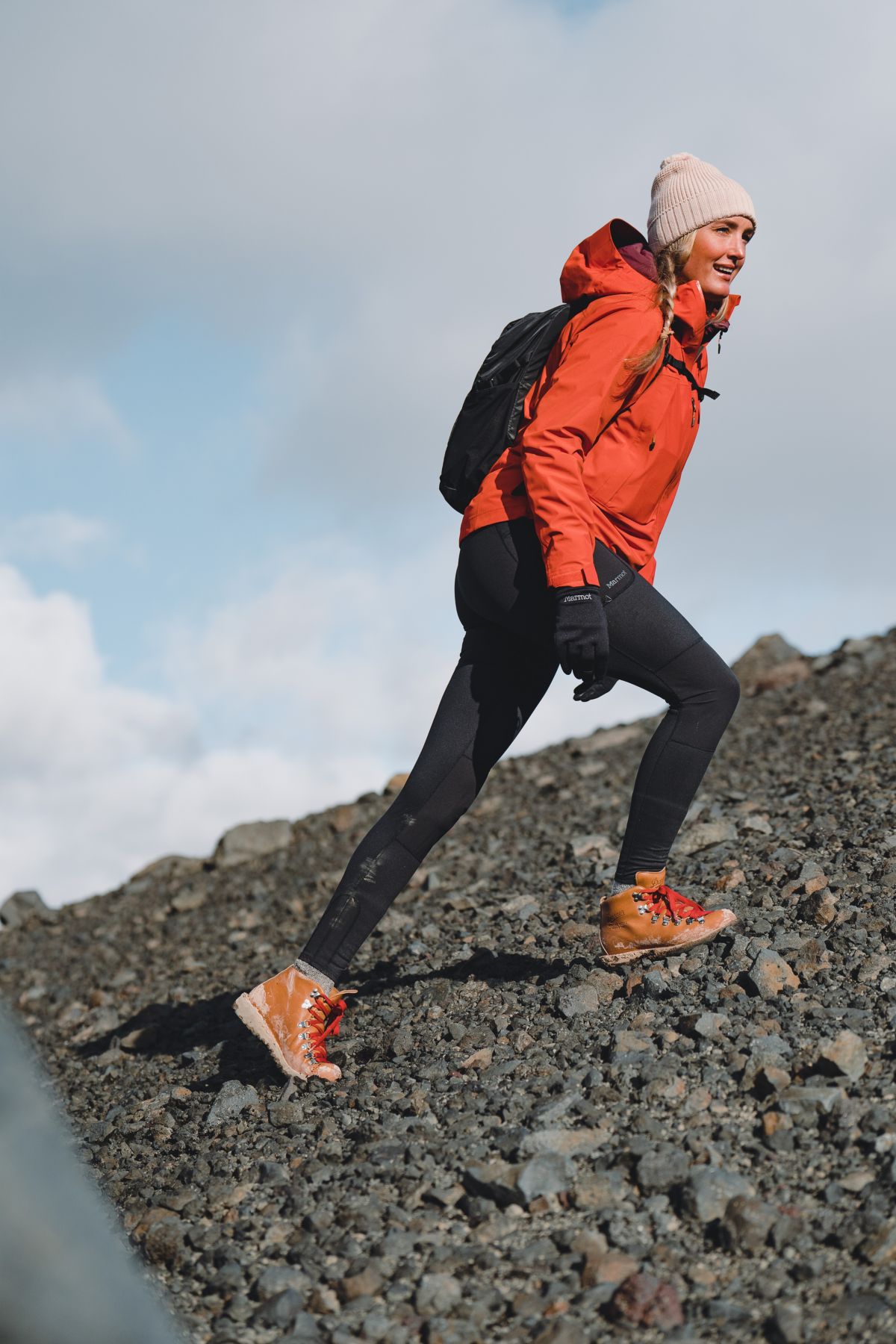 hiker in hiking gear on mountain