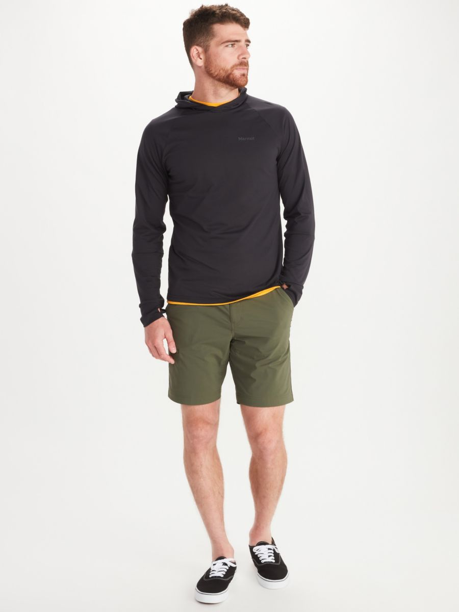man modeling shorts and long sleeve tee shirt