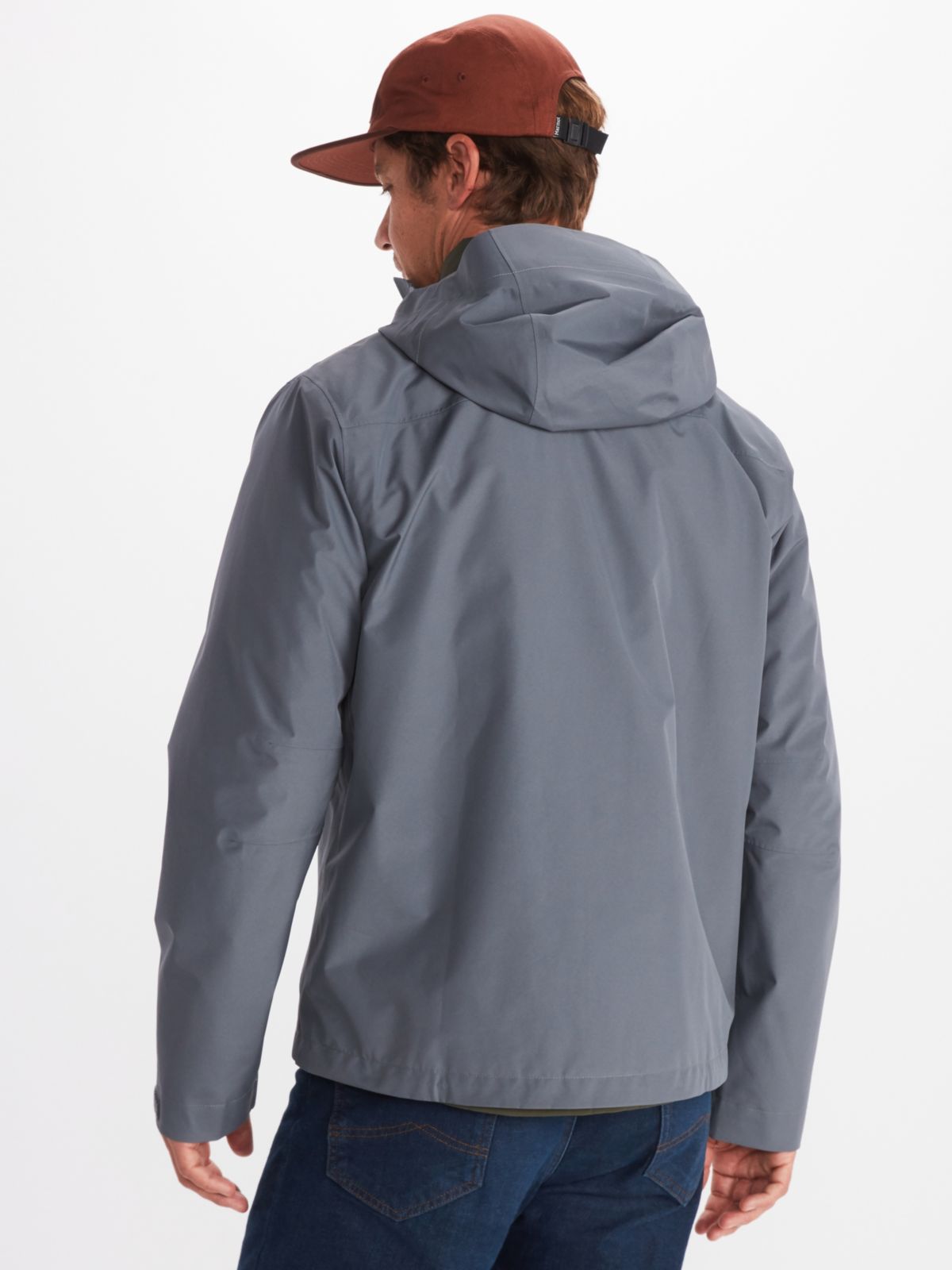 Model in Marmot men's rain wear in gray with attached hood