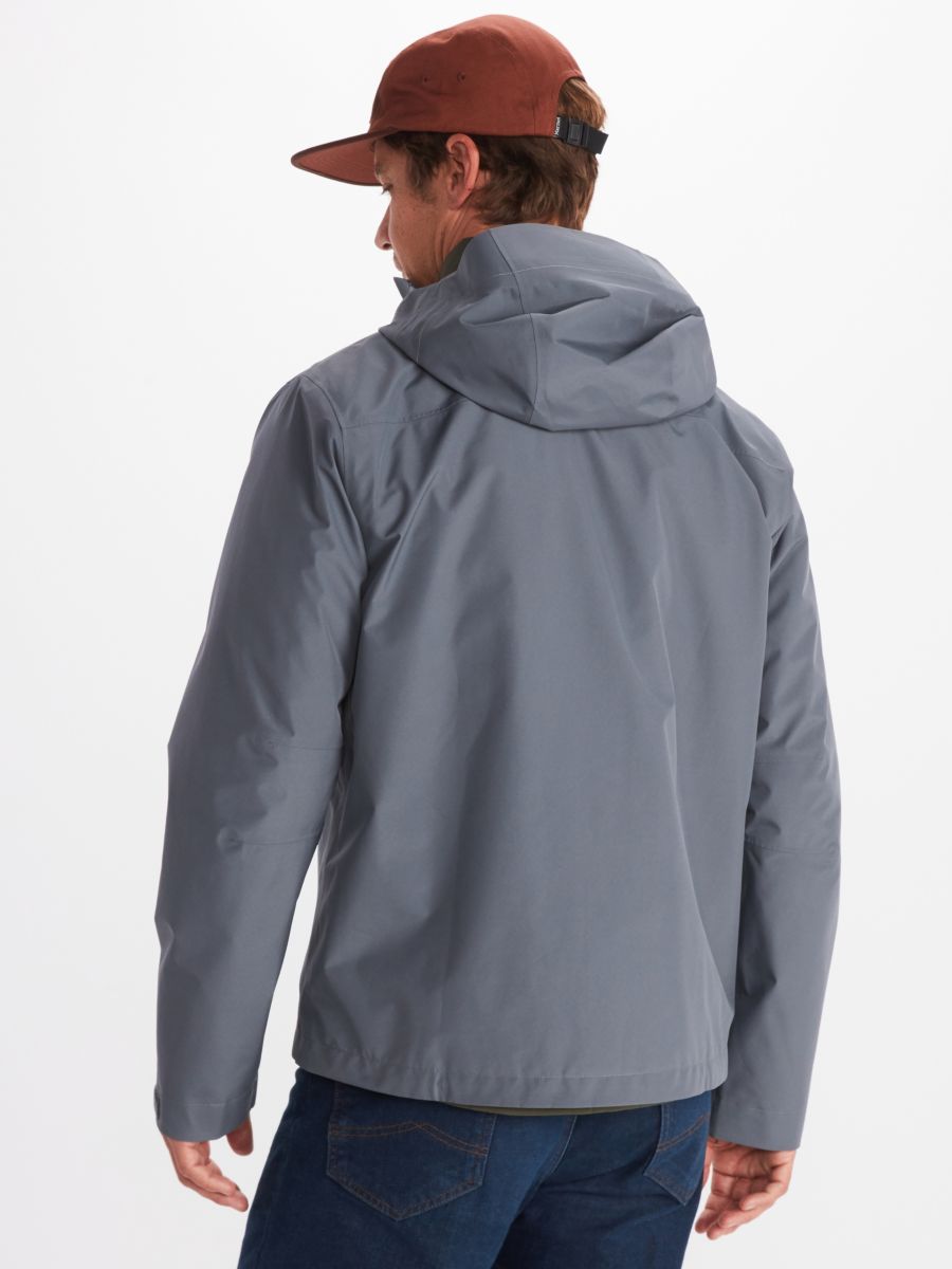 Model in Marmot men's rain wear in gray with attached hood