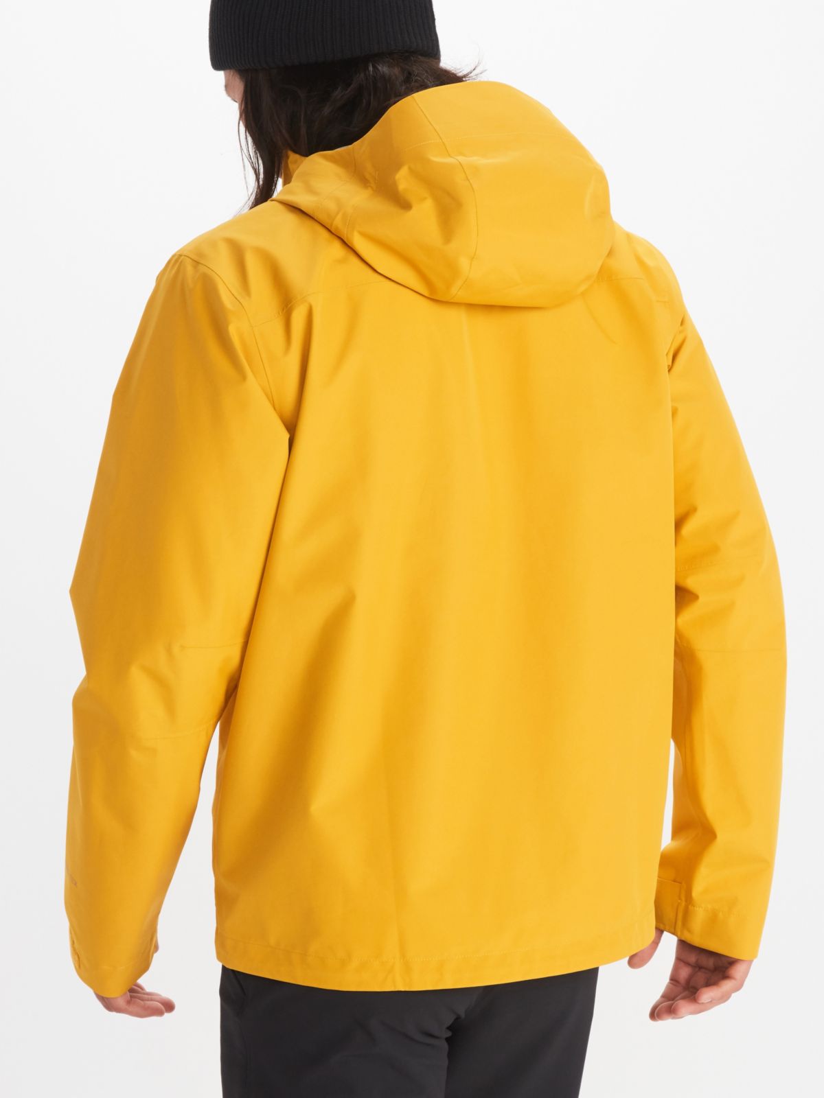 Model in Marmot men's rainwear in yellow with hood