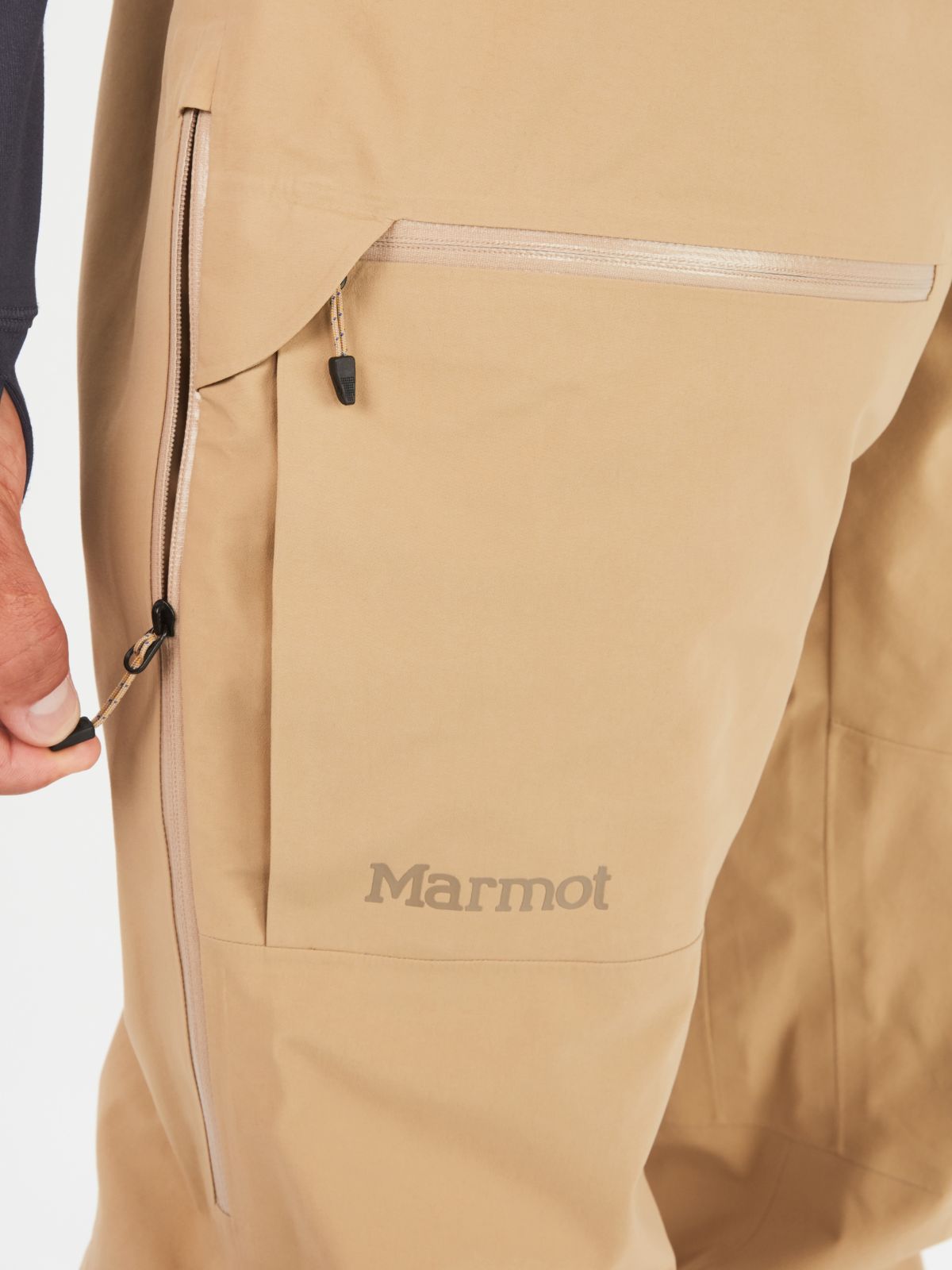 up close of zipper on cargo pants