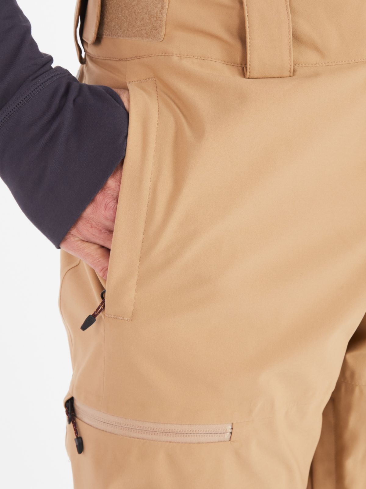 Man with hand in pants pocket