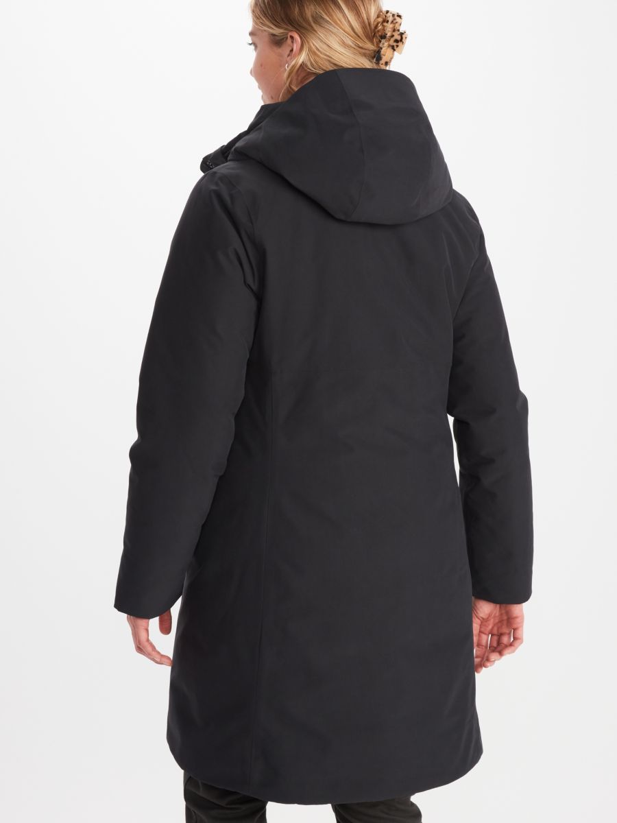 Model wearing Marmot women's insulated hooded coat in black