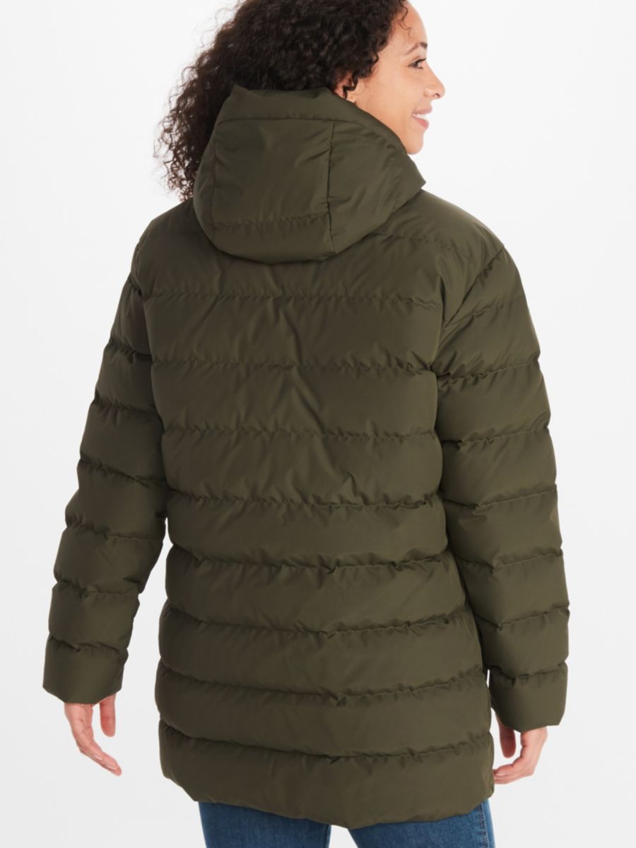 back of woman posing in outdoor clothing