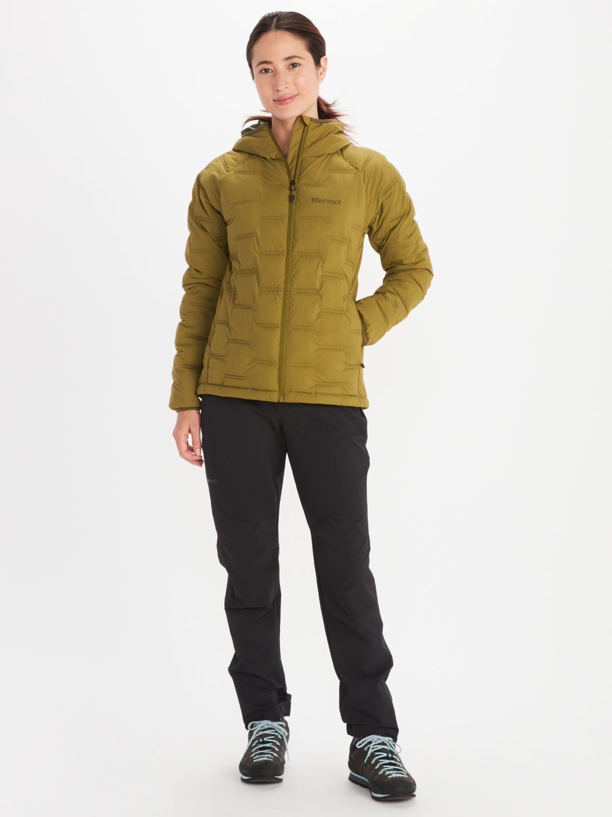 model wearing women's quilted jacket and hiking pants