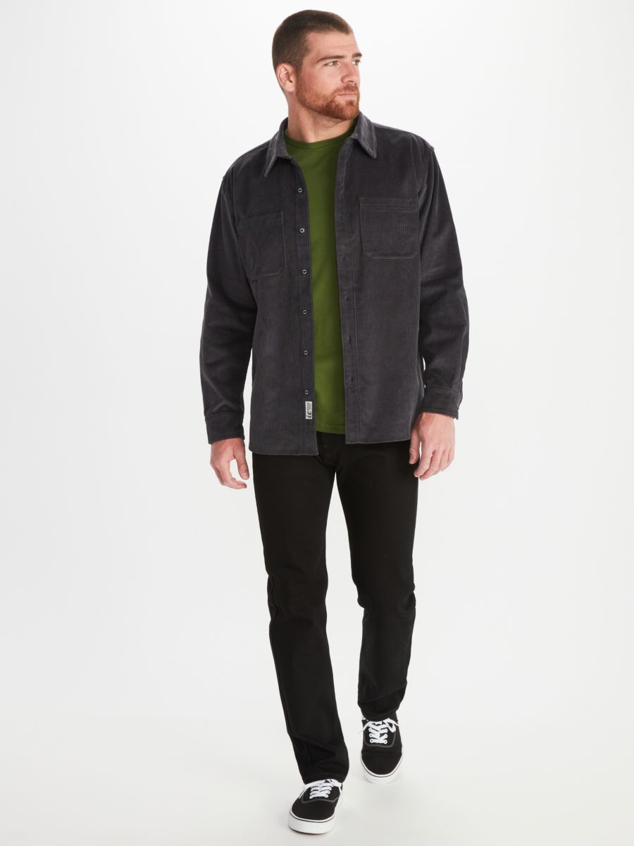 Model wearing Marmot men's button front insulated flannel long sleeve shirt