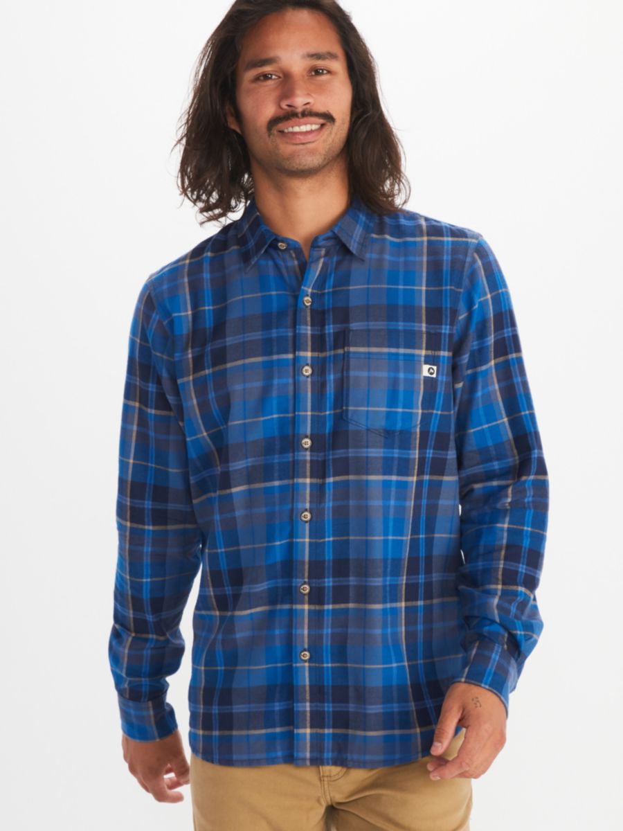 model wearing long sleeve button down flannel shirt