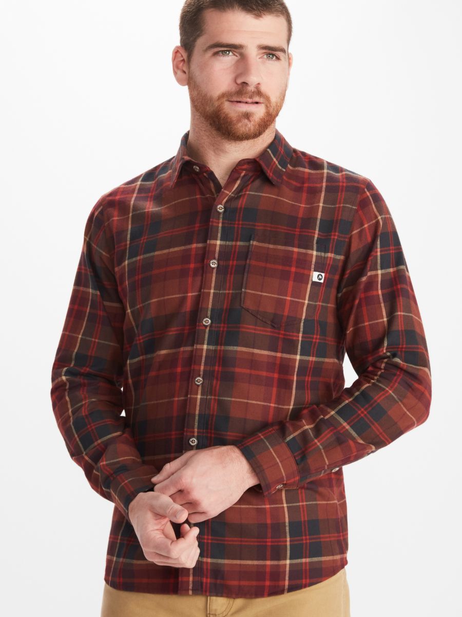 model wearing long sleeve button down flannel shirt