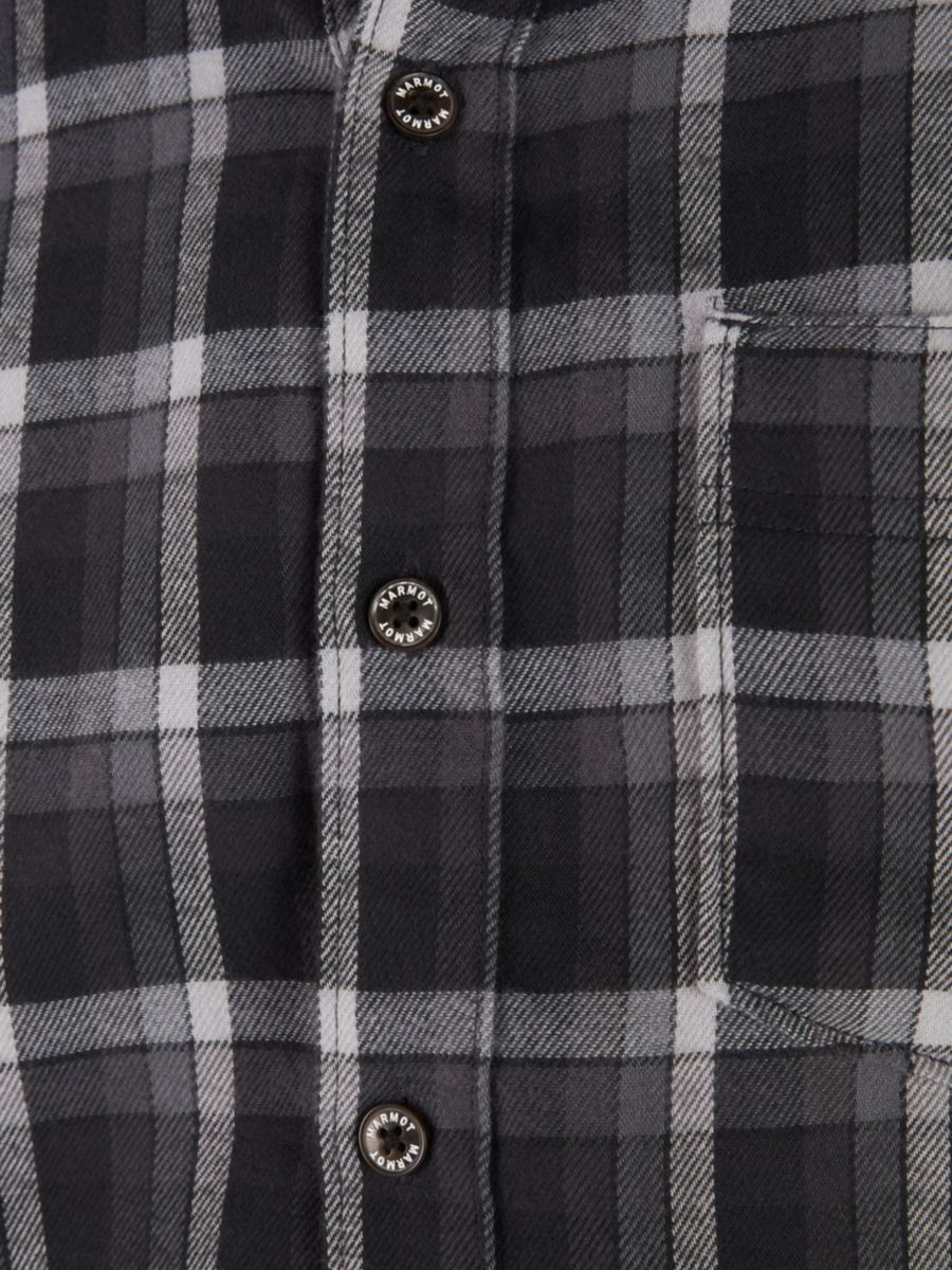 Button placket of Marmot men's flannel shirt in black and white plaid