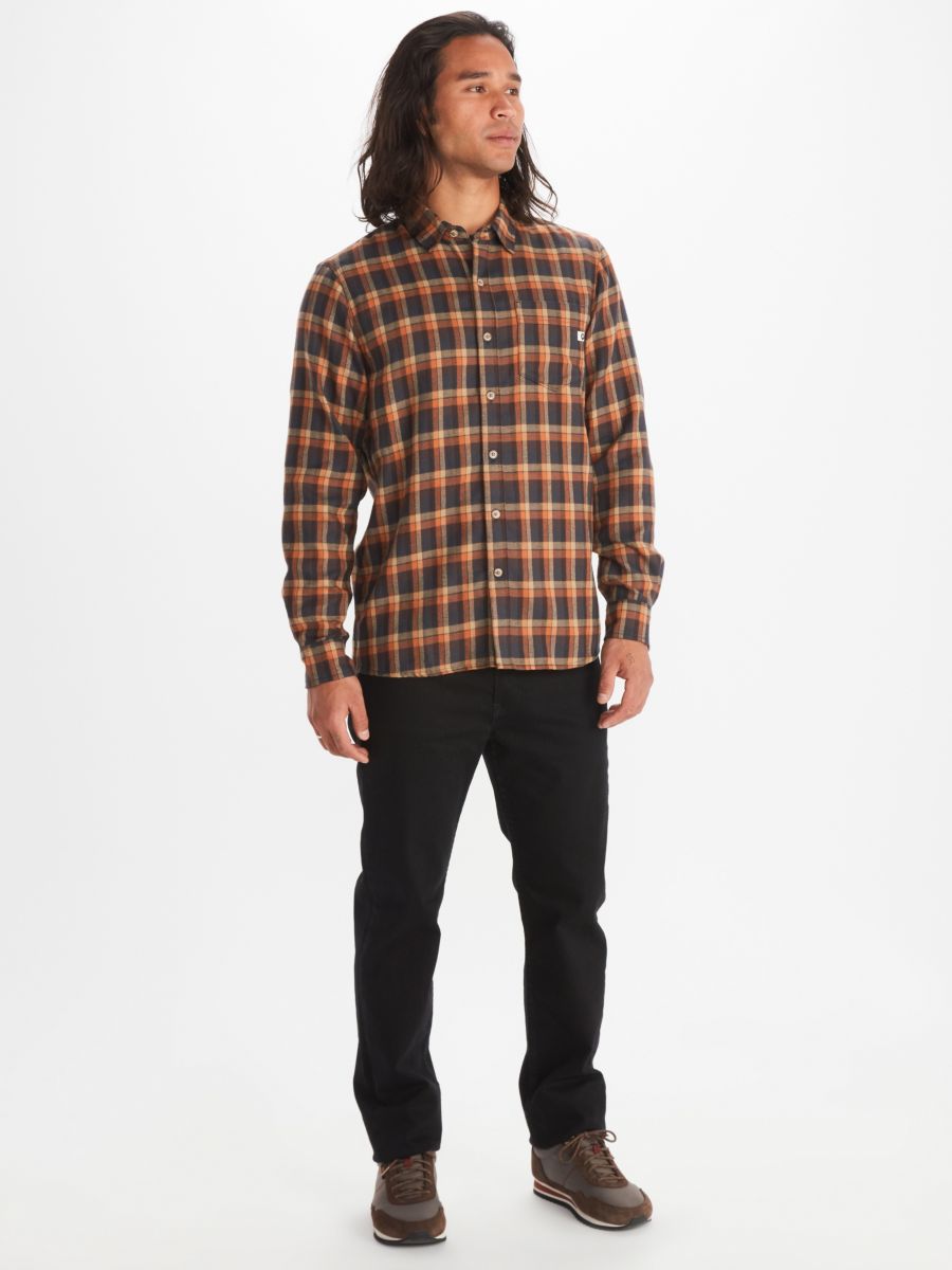 Model wearing Marmot men's long sleeve flannel shirt in plaid