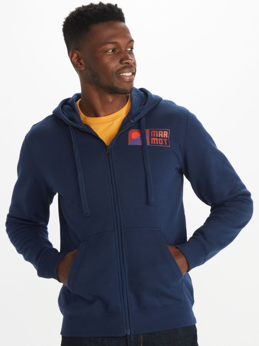 Model in Marmot men's full zip sweatshirt with hood and graphic logo