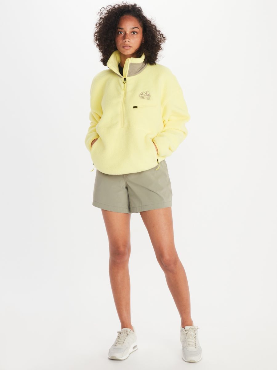 Woman in fleece top and shorts