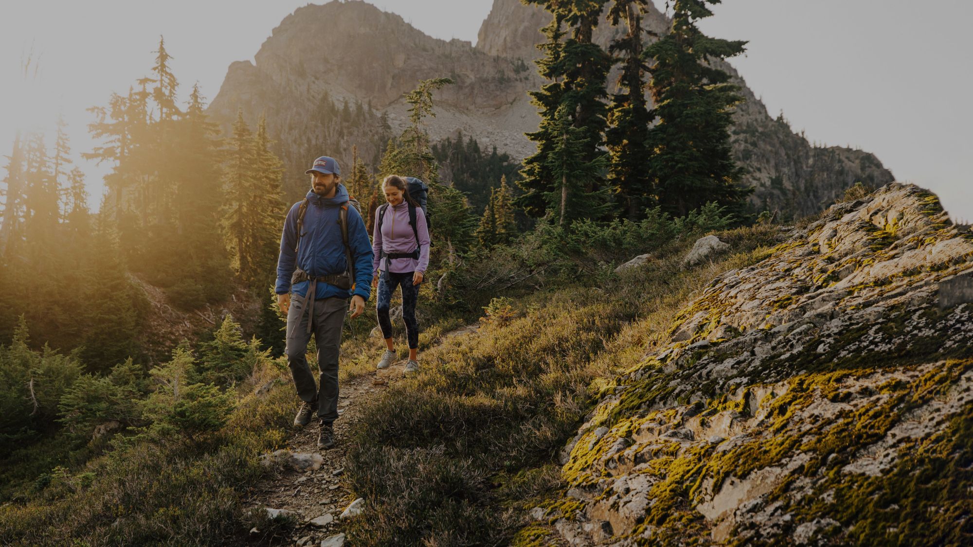 man and woman hiking